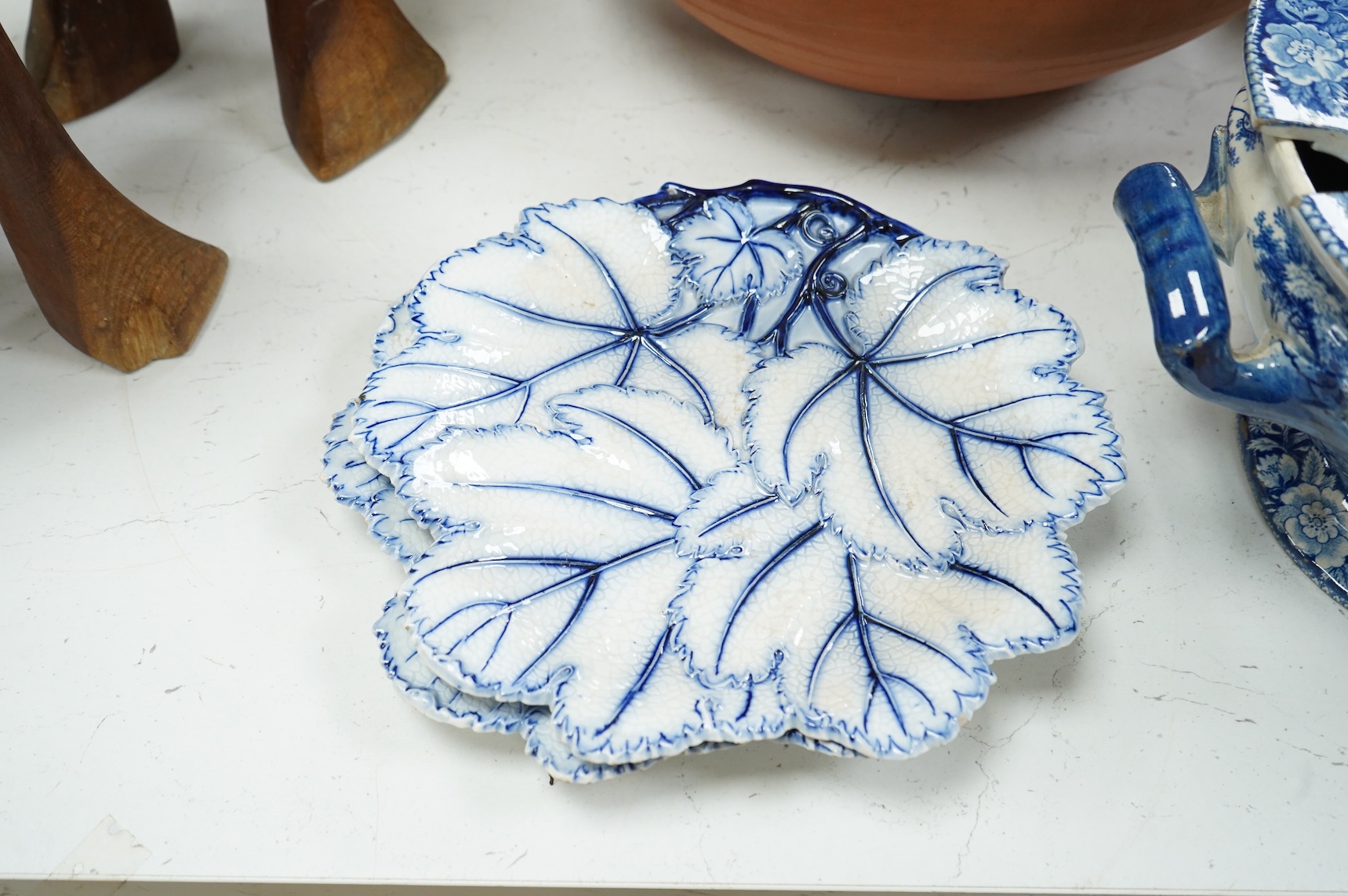 An early 19th century pearlware tureen, a pair of pearlware leaf dishes, a glazed earthenware jug and basin